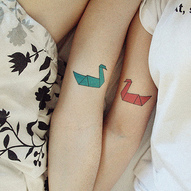 татуювання: лебеді